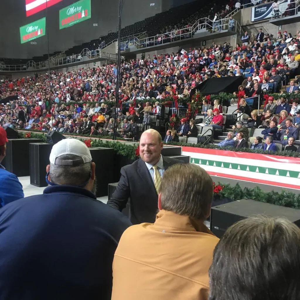 Joel Carter shaking hands